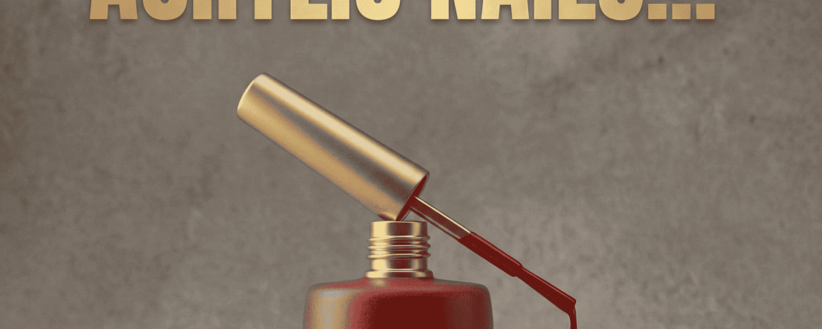 Red nail polish bottle with open brush on silky fabric, revealing acrylic nail invention.